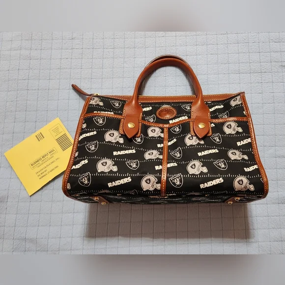 Dooney and Bourke - Picture 1 of 7